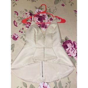 Fancy beige shirt, size S. Easy to adjust and style. It is in great condition!